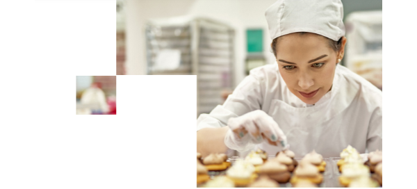 Chef garnishing baked goods